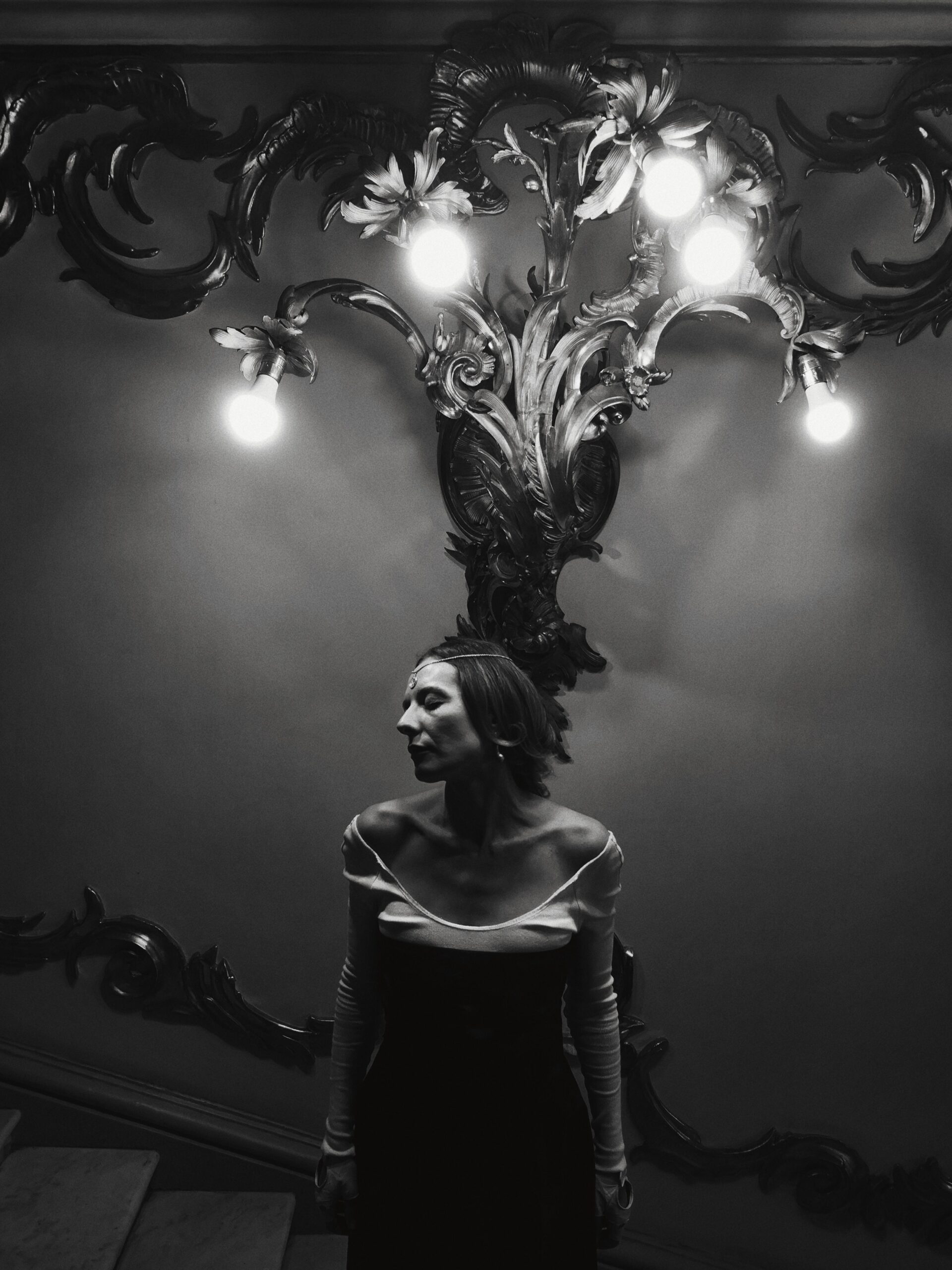 lady looking to the side underneath lights | jade rhoads blog